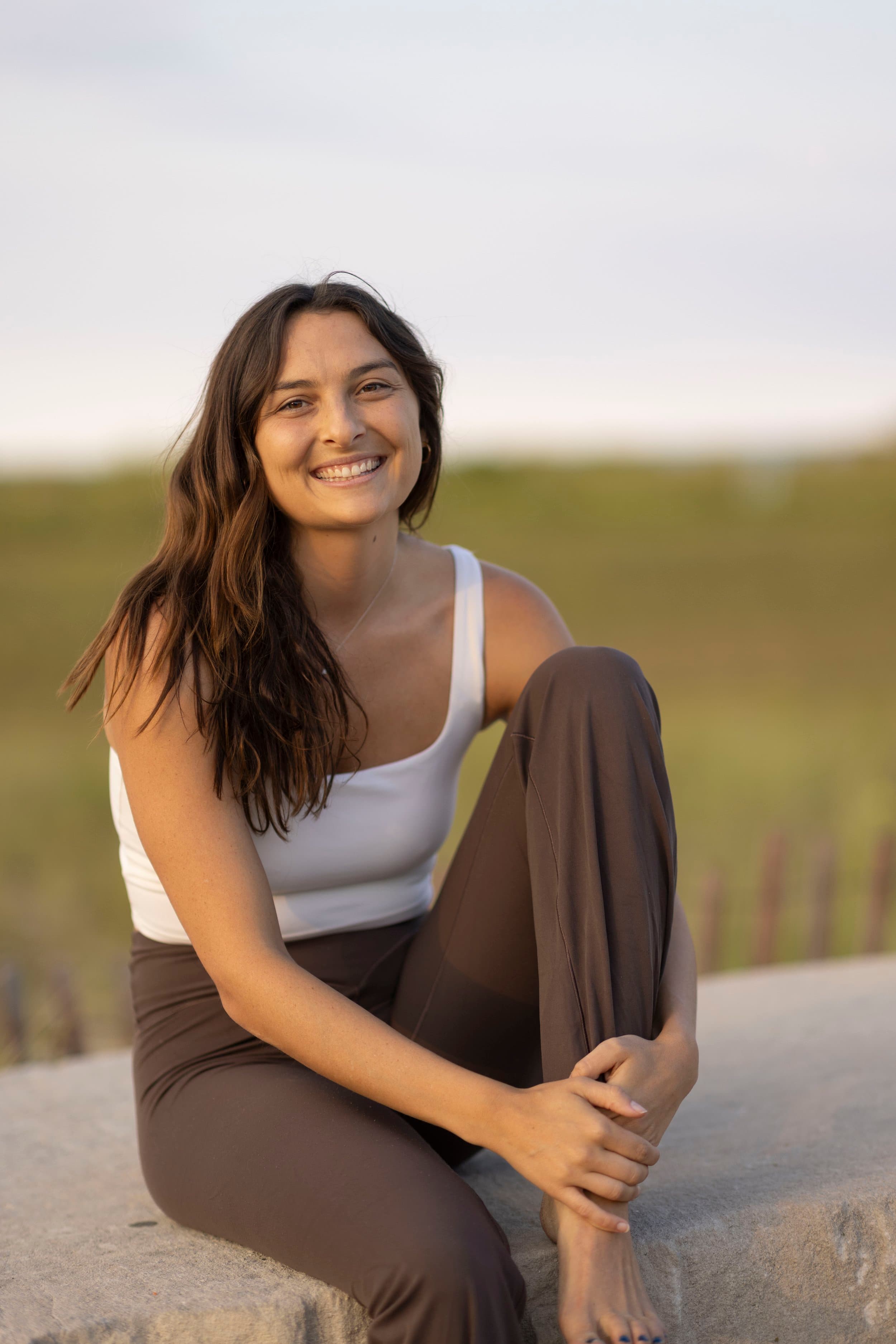 Ali smiling outdoors